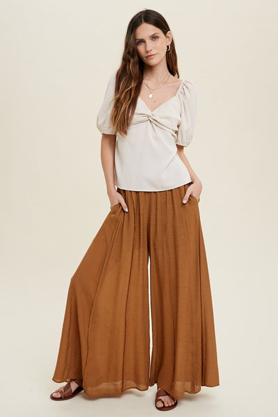 WIDE LEG PANTS WITH RAW EDGE DETAIL