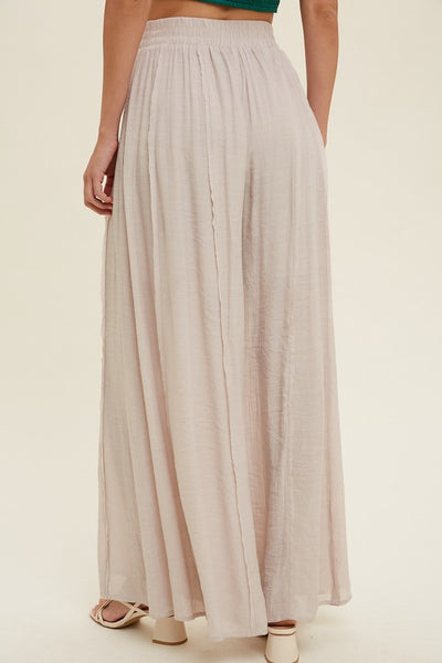WIDE LEG PANTS WITH RAW EDGE DETAIL