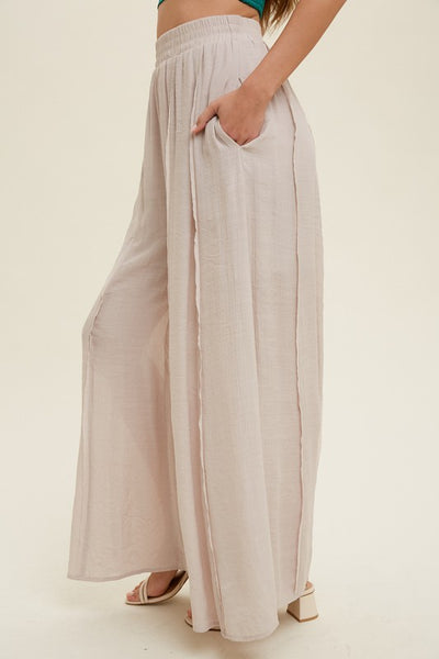 WIDE LEG PANTS WITH RAW EDGE DETAIL
