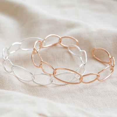 Infinity Link Torque Bangle in Rose Gold